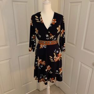 Knee-length floral wrap dress